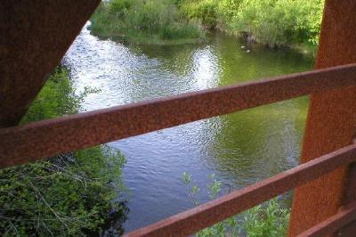 A fence and a river jigsaw puzzle