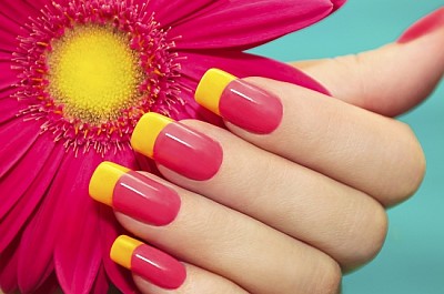 Manicure with pink and yellow varnish with flower  jigsaw puzzle