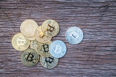 Bitcoin on wooden background. Golden bitcoin crypt jigsaw puzzle