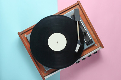 Vinyl player on a blue pink pastel background. Top jigsaw puzzle