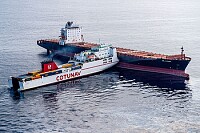 Two ships locked together after a collision