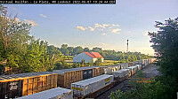 2 trains passing LaPlata,MO/USA Amtrak depot